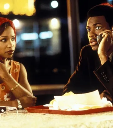 Chris Tucker and Elise Neal in Money Talks (1997)